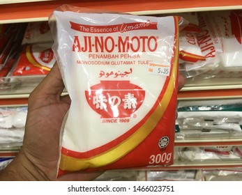 Kluang, Johor / Malaysia - July 30, 2019 : Hand Holding Ajinomoto Food Seasoning Packet On Supermarket Store.