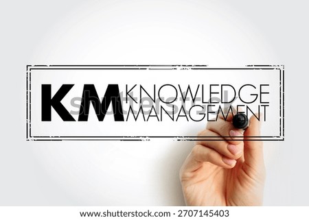 KM - Knowledge Management is the process of identifying, organizing, storing and disseminating information within an organization, acronym concept stamp