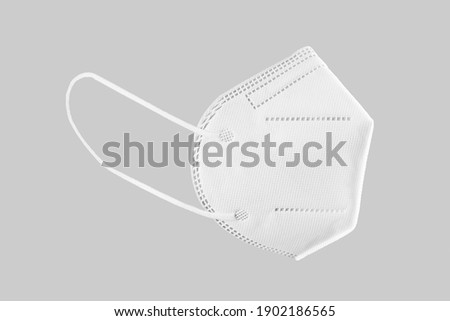 KN95, FFP2, FFP3 Face mask isolated on gray background. Personal protective equipment against Covid-19 Stock photo © 