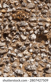 Knapped flint masonry forms a close wall texture at St Augustine's Abbey in Canterbury, Kent, England