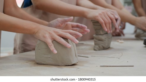 Kneading clay material before making pottery - Powered by Shutterstock