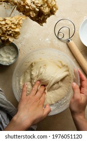 Kneading Dough. Cooking Homemade Sourdough Bread. Hands Mixing Bread Dough In A Bowl