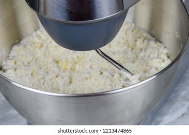 Kneading Dough In Modern Food Processor On A Kitchen Table