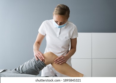 Knee Joint Sports Rehab Massage And Physiotherapy In Face Mask