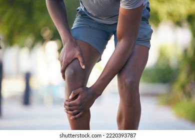 Knee Pain, Arthritis And Legs Of Man Runner During Training, Running Or Cardio Workout In Park. Muscle, Leg And Sport Injury By Athletic Guy On Morning Run, Pain And Inflammation, Fracture And Hurt