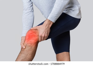 Knee Pain Concept. Inflammation Highlighted In Red, Free Space