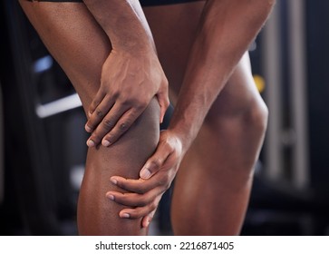 Knee Pain, Fitness Injury And Black Man Legs In Sport Health Club. Closeup Of Runner Athlete Leg Medical Emergency, Accident During Workout Training Or Torn Muscle In Cardio Sport Wellness At Gym