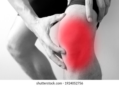 Knee Pain Man He Puts His Hands On His Knees, Pain Points From Osteoarthritis And Bone Diseases, Medical Concepts And Treatments.