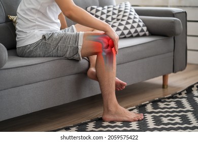 Knee pain, man suffering from osteoarthritis at home, chiropractic treatments concept
