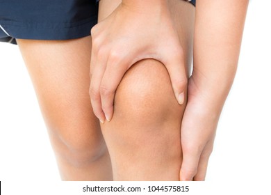 Knee pain woman she was massaging at her knee she is very painful From standing long walk isolated on white background