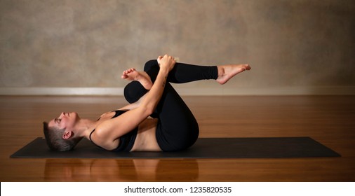 Knees Pulled To Chest Stretch