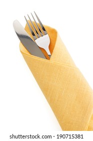 Knife And Fork At Napkin Isolated On White Background