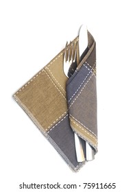 Knife And Fork In A Napkin On A White Background