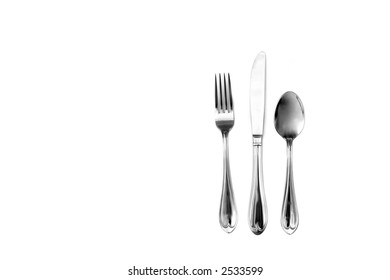 Knife fork and spoon silverware with white background