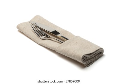 Knife And Fork In Textile Napkin