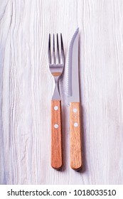 Knife And Fork With The Wooden Handle. 