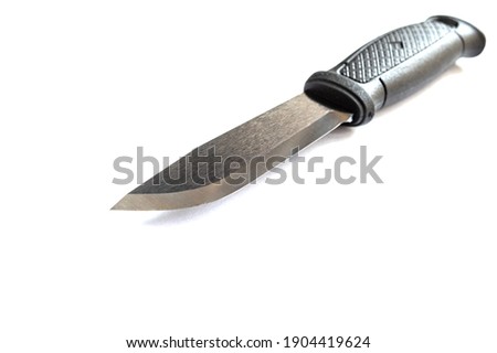 Knife lying at an angle. Knife underneath on a white background. Angle.