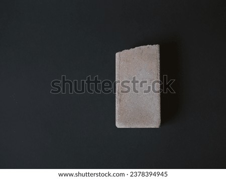 Knife sharpening stone on a black background