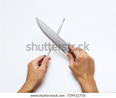 Knife sharpening with whetstone sharpener or grindstone, The abrasive which sharpen the knife blade, man using a knife grinder, man hand sharpenes knife on white background