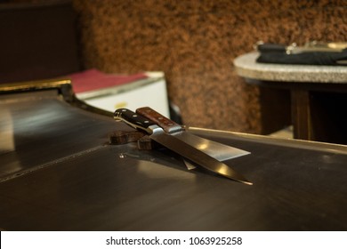 Knife And Spatula On A Teppanyaki Grill