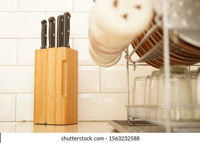 Knife In Their Wood Holder - Kitchen Scene Background Image