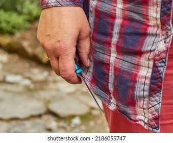 Knife In A Woman's Hand.