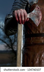 Knight Holds A Bloody Axe