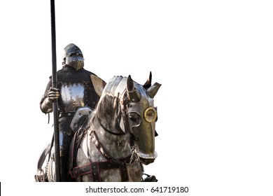 Knight on horseback. Horse in armor with knight holding lance, isolated on white background. Horses on the medieval battlefield.