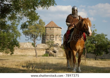  	Knight riding a horse in castle