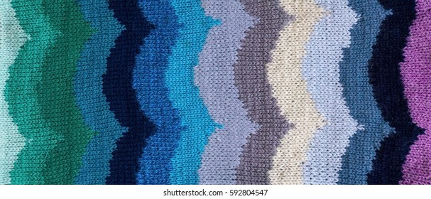 Knitted handmade fabric fragment with an ornament in the form of - Shutterstock ID 592804547
