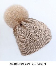 
Knitted Hat With Fur Pompom. Knitted Beanie