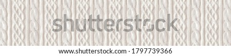 
Knitted pattern.  Horizontal ornament. Textile background for banner, site, postcard, wallpaper, skinali