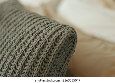 Knitted Pillow Grey Color Texture On Bedspreads In Bedroom. Cozy Style Of Room Design For Home, Lifestyle, Urban, Living, Real Estate Home Page. Earth Tones Interior Using As Wallpaper Background