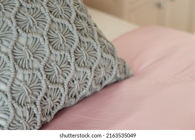 Knitted Pillow Grey Color Texture On Bedspreads In Bedroom. Cozy Style Of Room Design For Home, Lifestyle, Urban, Living, Real Estate Home Page. Earth Tones Interior Using As Wallpaper Background