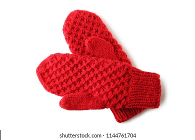 Knitted red gloves isolated on white background
