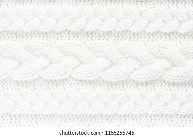 Knitted warm white winter sweater. Huggy style.