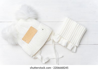 Knitted Winter Accessories. White Woolen Snood And Hat. Label Mockup. Place For Your Design