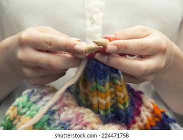 Knitting A Colorful Scarf, Closeup Of The Hands