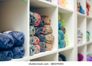 Knitting yarn on shelf, closeup photo