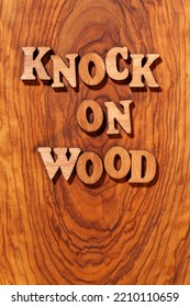 Knock On Wood Phrase By Wooden Letters Close Up