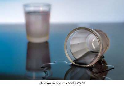 Knocked Over / Fallen / Spilled Shot Glass Alcoholism Concept