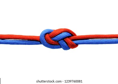 Knot  on a cord isolated on a white background .