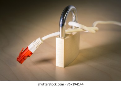 Knotted Net Cable Around A Padlock. Suitable For Concepts As US Government Net Neutrality Regulations, Internet Freedom Preservation Act , Open Internet Order.