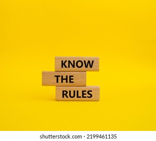 Know the rules symbol. Wooden blocks with words Know the rules. Beautiful yellow background. Business and Know the rules concept. Copy space. - Shutterstock ID 2199461135
