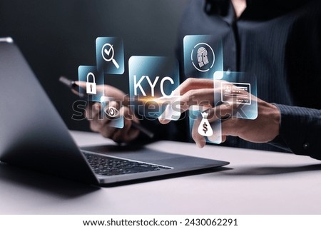 Know your customer concept. Business verifying the identity of clients for KYC financial client authentication. Person use smartphone and laptop with virtual KYC icon.