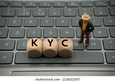 Know Your Customer (KYC) Are A Set Of Standards Used Within The Investment And Financial Services Industry To Verify Customers, Their Risk Profiles, Financial Profile.word Is Written On Dice, Keyboard