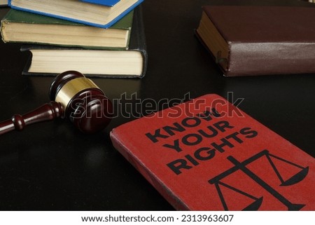 Know your rights is shown using a text on the book and photo of the gavel