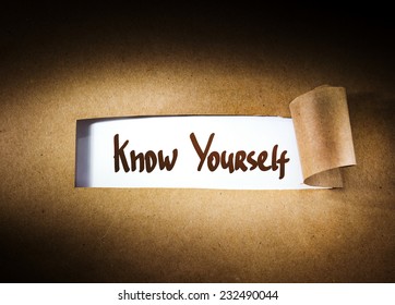 Know Yourself  Appearing Behind Torn Brown Paper