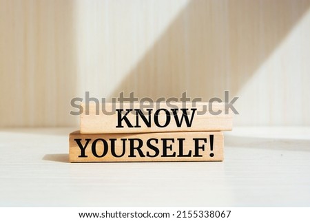 Know yourself text concept written on wooden blocks lying on a table