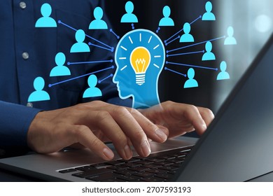 Knowledge sharing. Knowledge management and collaborative teamwork. Businessperson using laptop computer to exchange information.